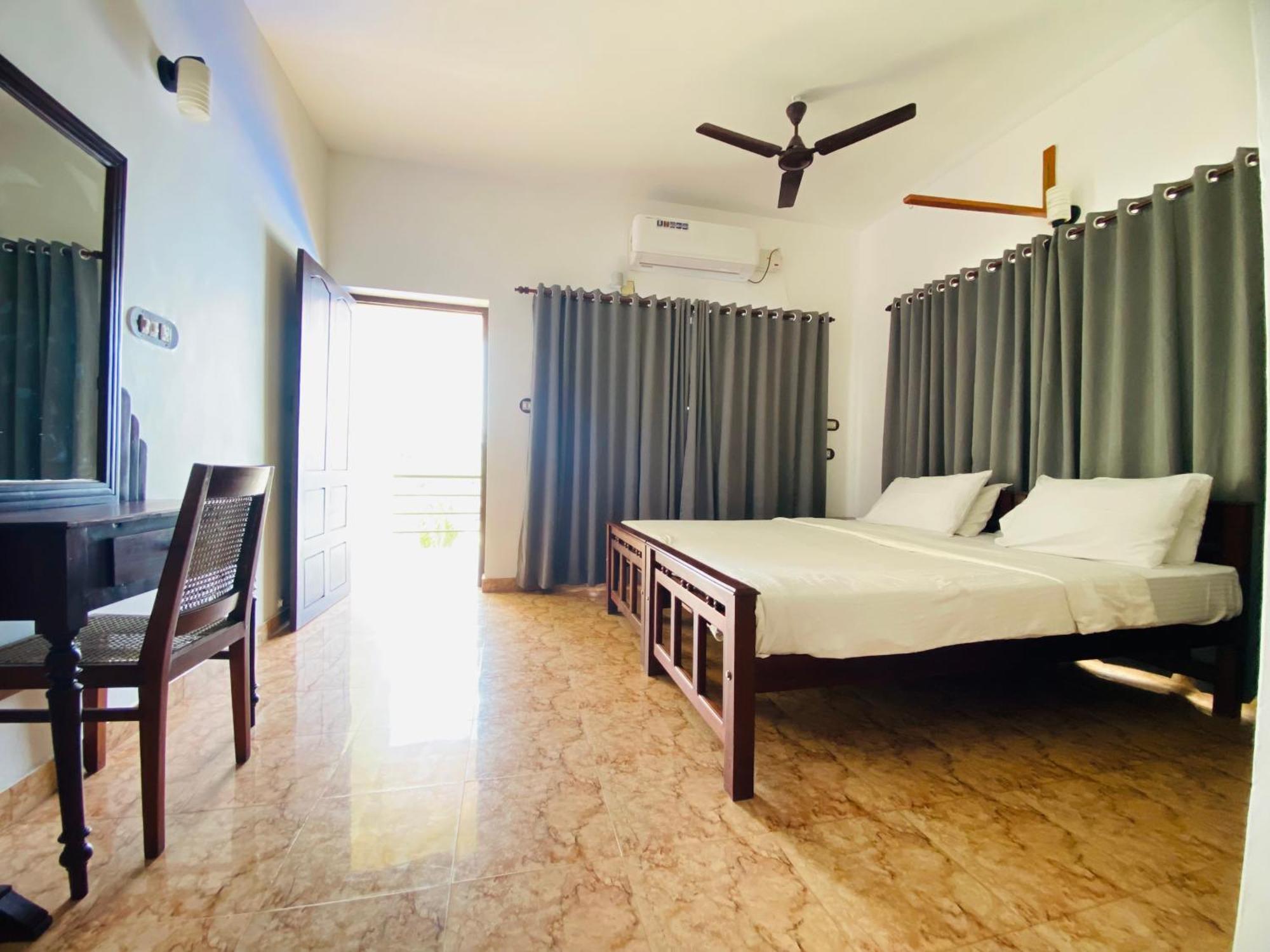 Karma Beach Resort Kovalam Rum bild