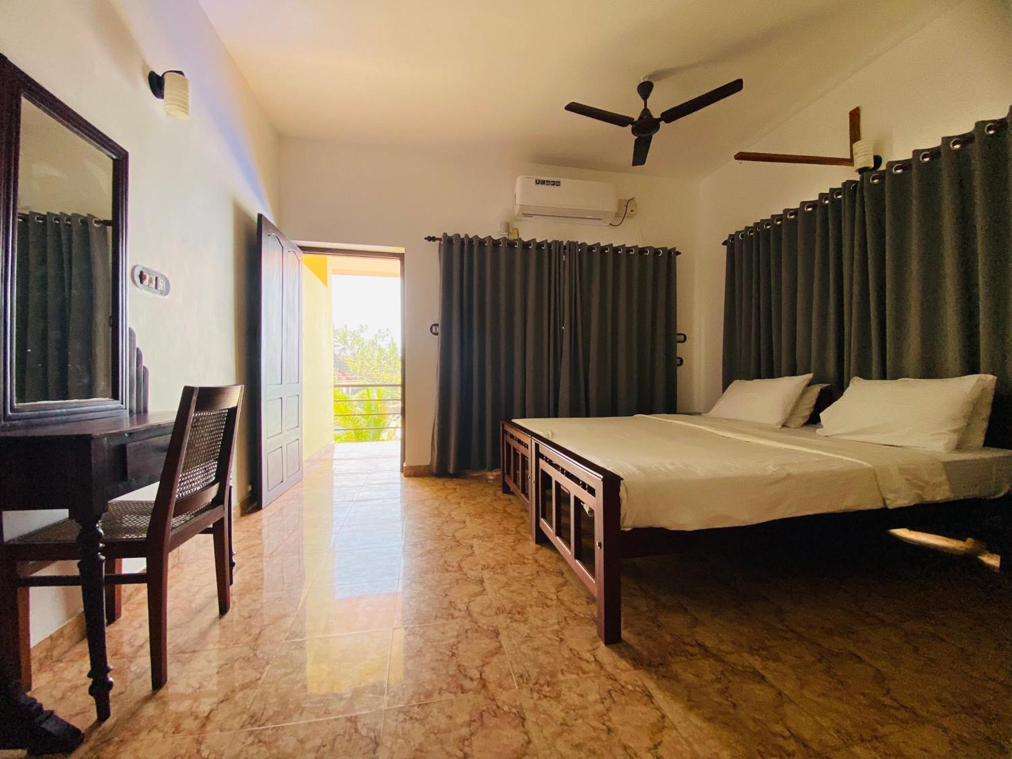 Karma Beach Resort Kovalam Rum bild
